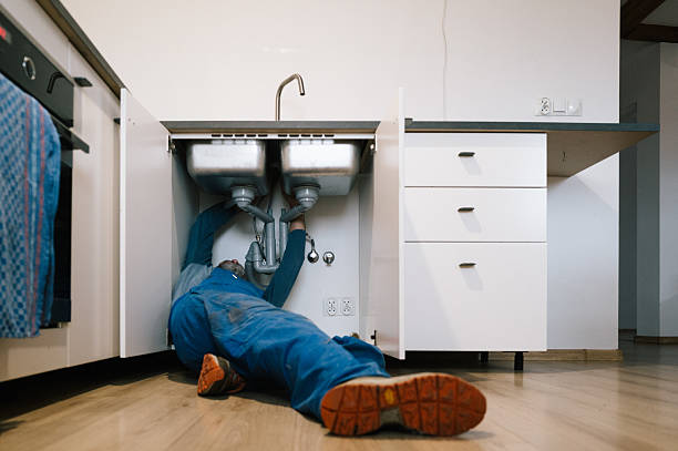 Professional Emergency Plumber technician working in Henderson, NY